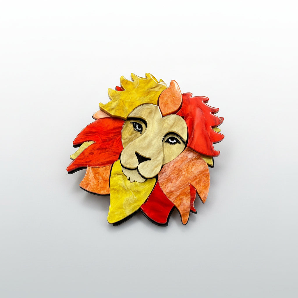 Acrylic lion head brooch featuring layered detailing on a soft white background