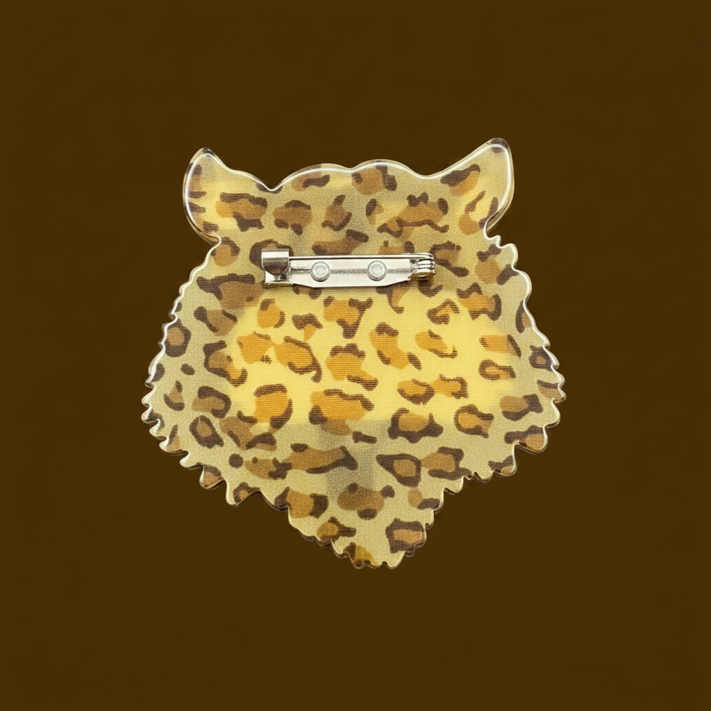 Back view of the acrylic tiger head brooch showing the clasp mechanism