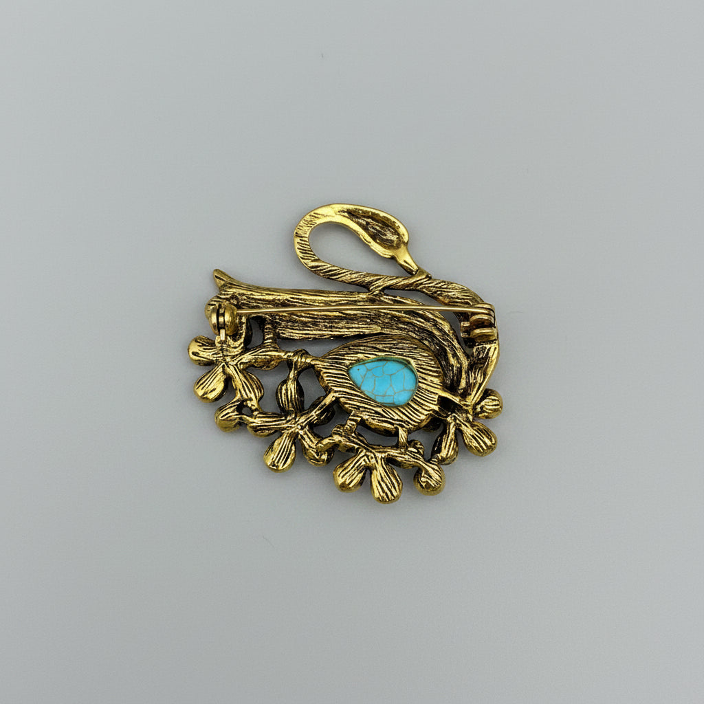 Back view of blue rhinestone swan brooch, showing the clasp mechanism