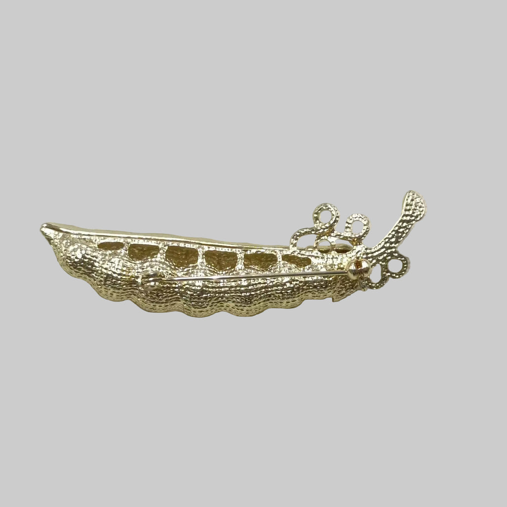 Back view of green enamel pearl pea pod brooch showing the clasp mechanism