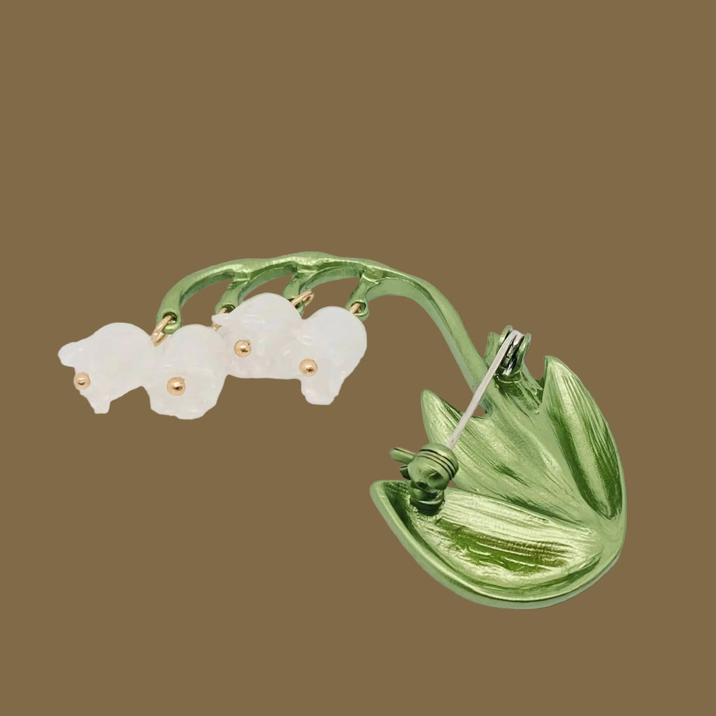 Back view of lily of the valley brooch showing the clasp mechanism