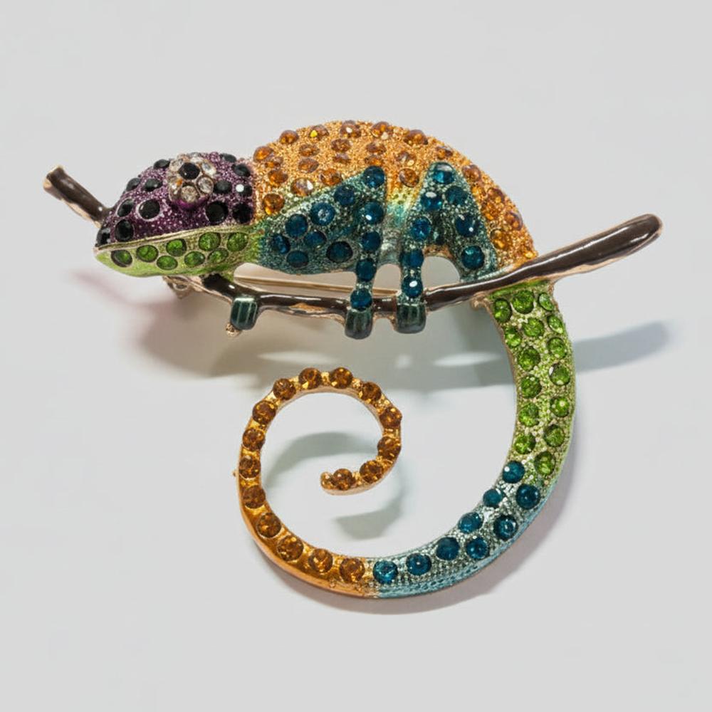 Colorful chameleon brooch pin featuring sparkling rhinestones and curved tail design