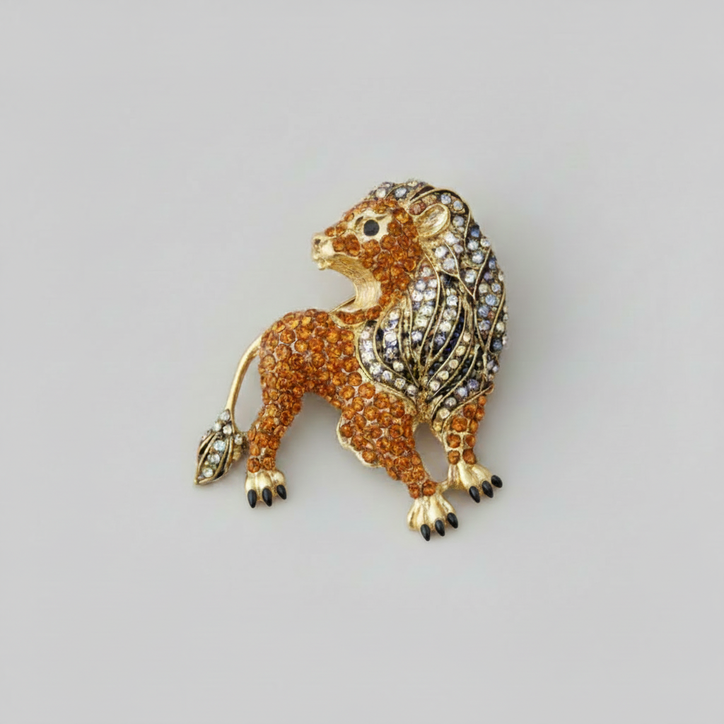 Dimensional lion shaped brooch finished with sparkling pave' set rhinestones and golden accents