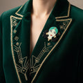 Gypsy girl acrylic brooch pinned on a green art deco outfit